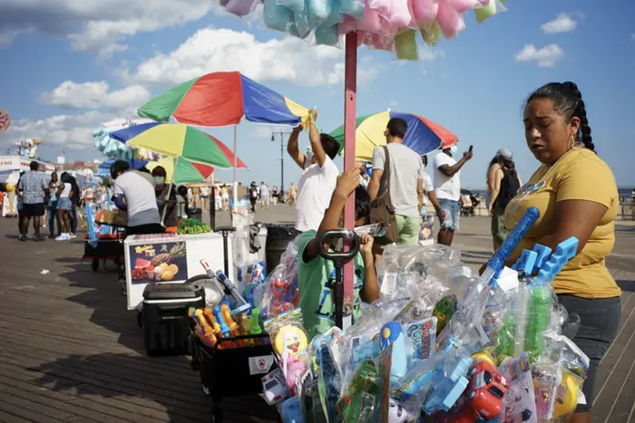people selling toys and treats in Coney Island